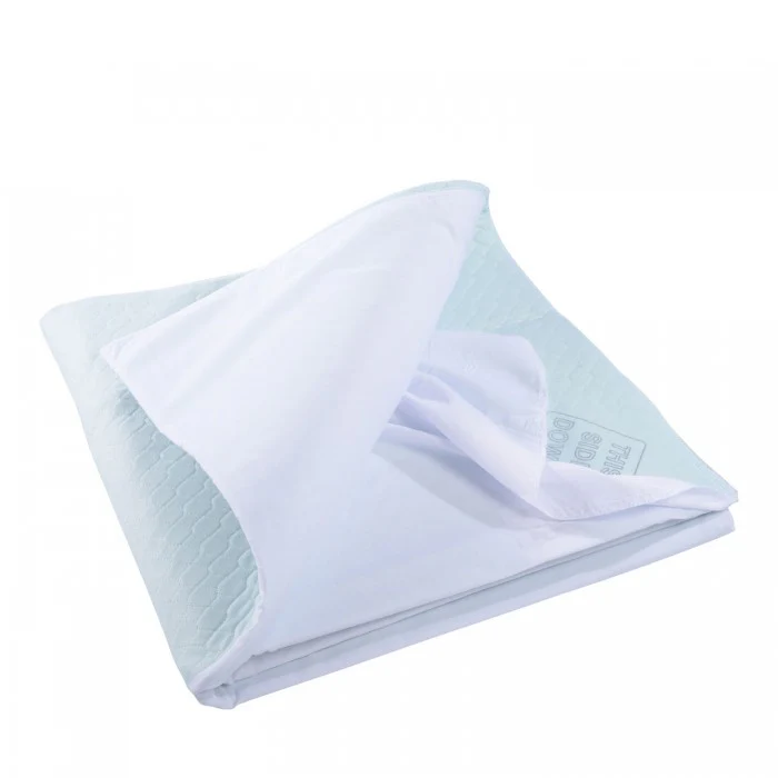 drycare-absorbent-bed-pad-tuckins-laminated-XD-100-SB-LAM-original-flipped-left-700x800 Drycare Deluxe Absorbent Bed Pad Sky Blue 100cm x 100cm, Each - All Types - Image 1